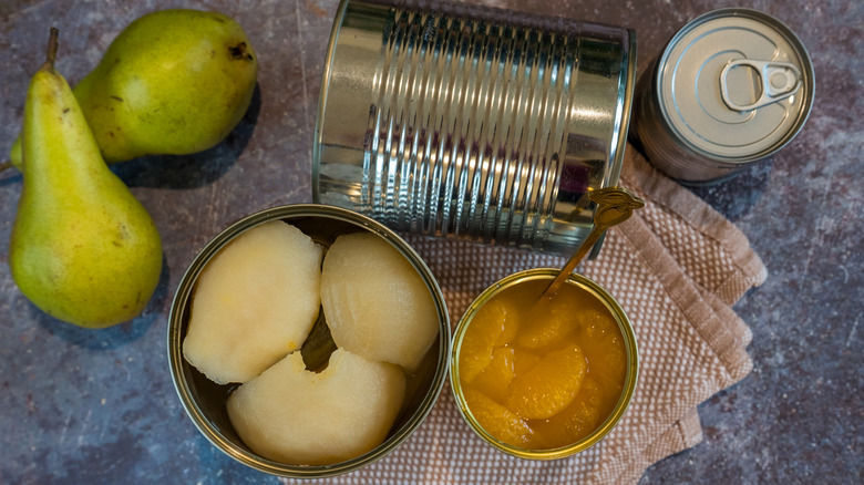 Canned pears and canned oranges.