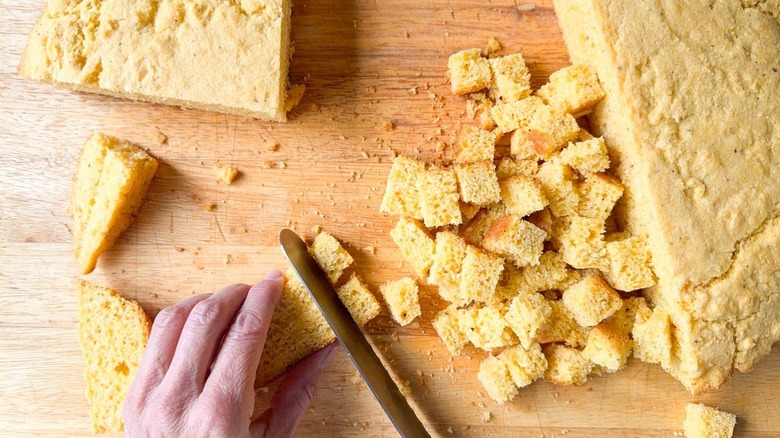 Cutting cornbread into cubes