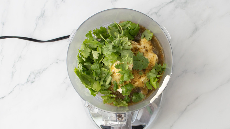 Cilantro, mayo, and salsa verde in food processor