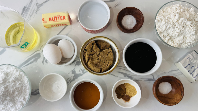 Ingredients for spiced gingerbread loaf with brown butter cream cheese frosting