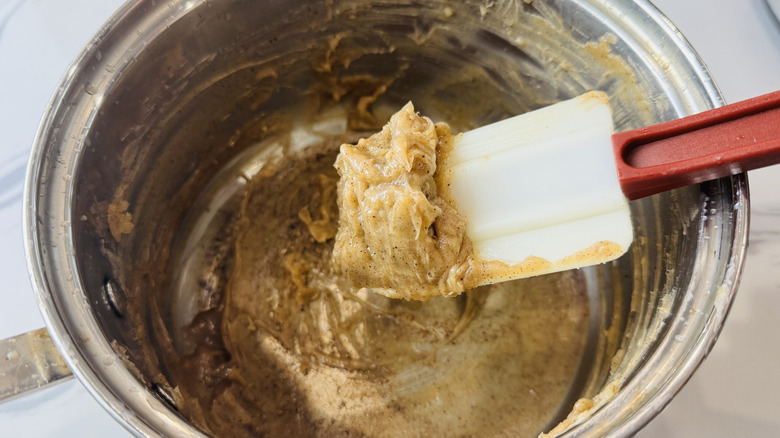Cooled brown butter in bowl