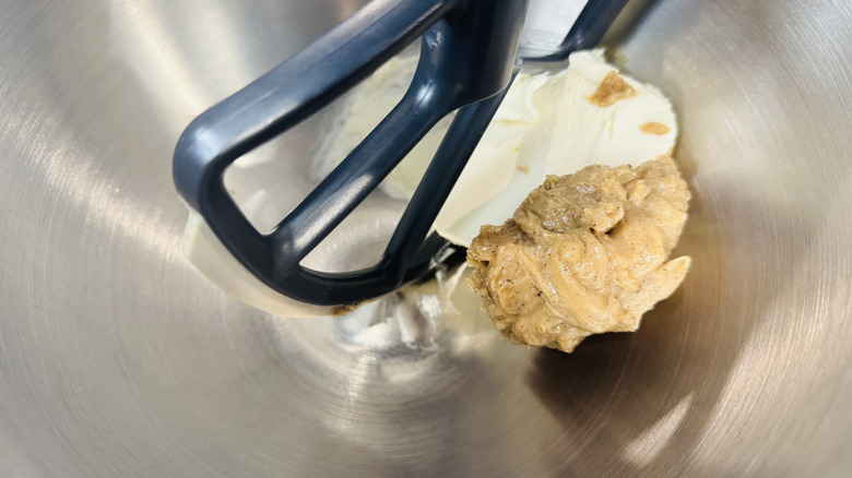 Cream cheese and brown butter in mixing bowl