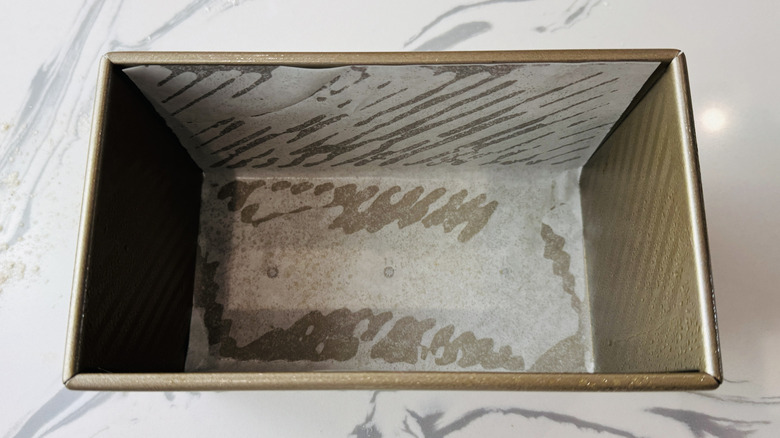 Large loaf pan lined with parchment paper