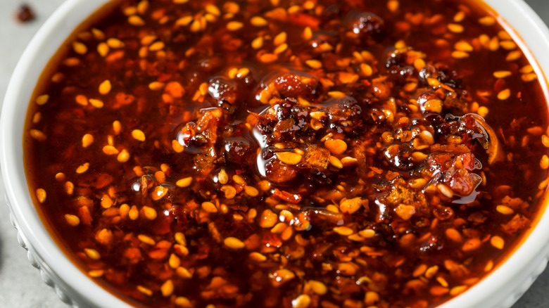 A close up of a large bowl of chili crisp oil