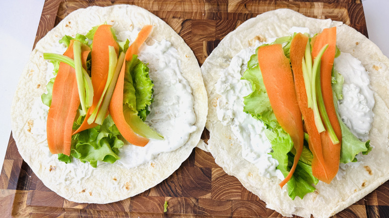 Veggies laid over tortillas