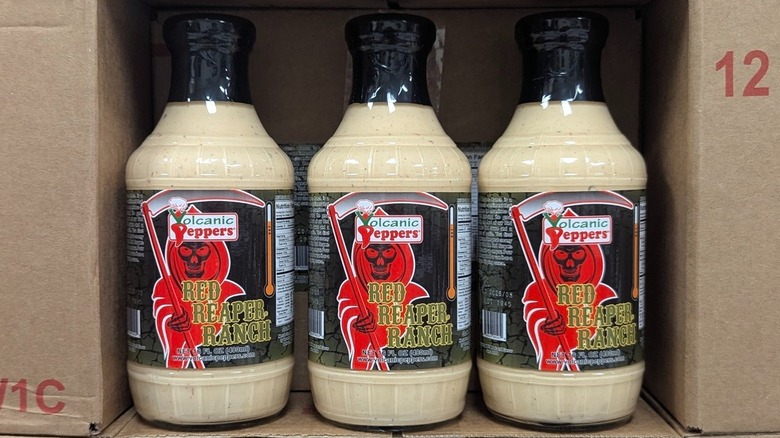 Three bottles of Volcanic Peppers Red Reaper Ranch sauce