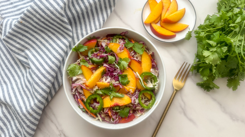 bowl of peach coleslaw