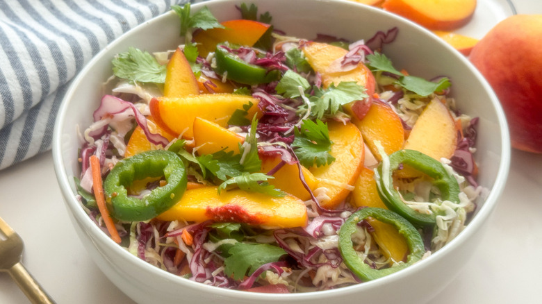 bowl of peach coleslaw