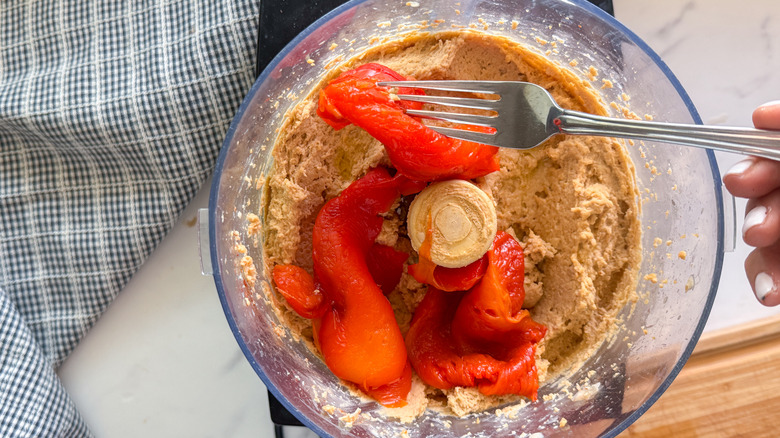 fork adding red pepper