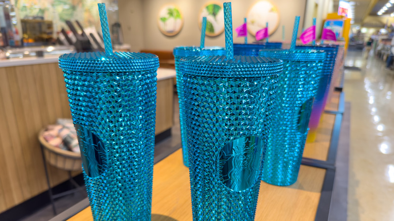 Starbucks studded tumblers displayed in a store