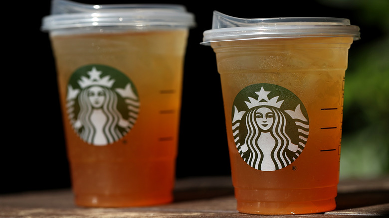 Two black iced teas from Starbucks