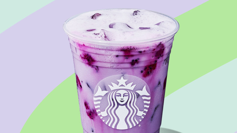 Starbucks Iced Lavender Oatmilk Chill on pastel patterned background.