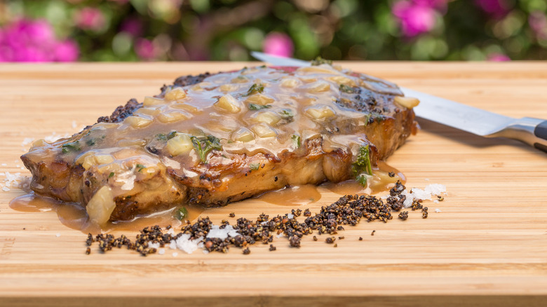 Steak Diane on cutting board