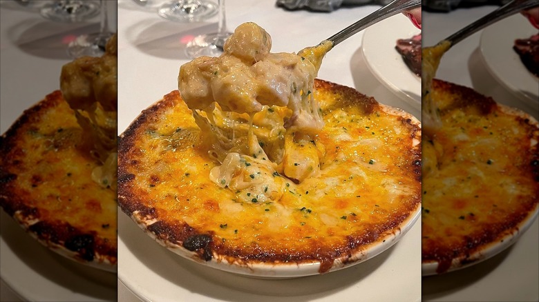 A serving of smoked gouda & bacon au gratin potatoes at Morton's The Steakhouse