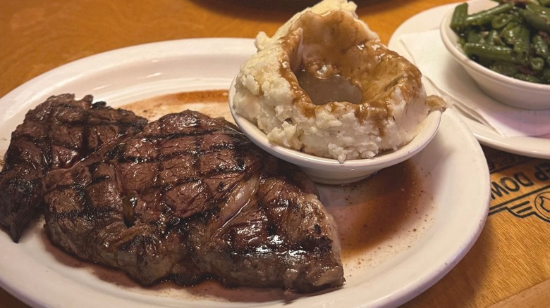 Giant restaurant ribeye meal