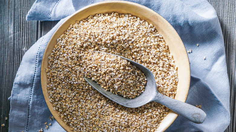 raw organic steel cut oats in a bowl
