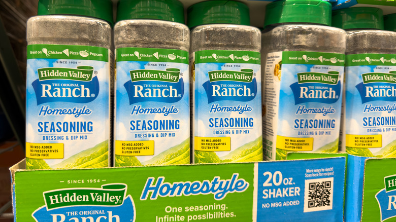 bottles of ranch seasoning are arranged on a shelf