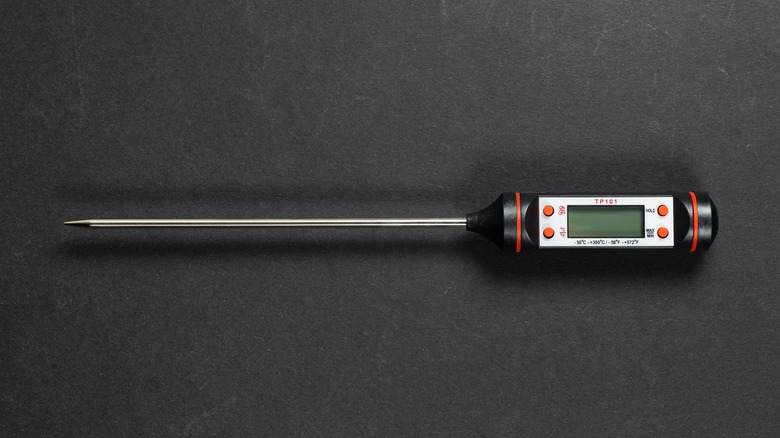 Probe thermometer on dark background