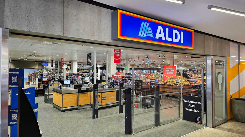entrance to Aldi supermarket with an Aldi sign