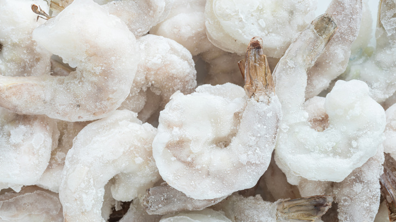 Top view of raw, frozen shrimp