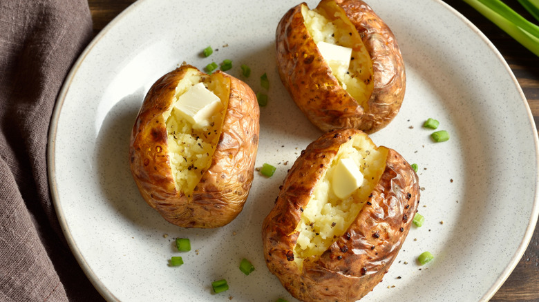 Baked potatoes cut in half.