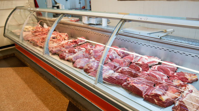 Various cuts of beef at a butcher counter