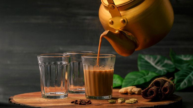 glass of chai being filled