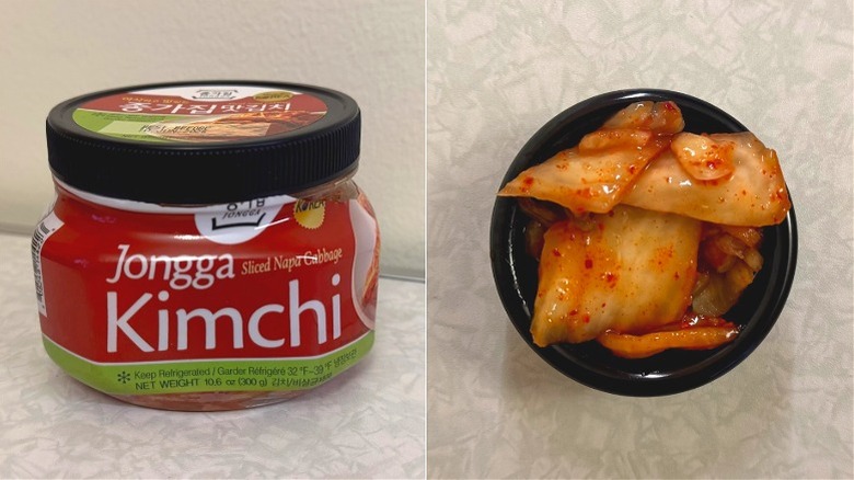 A small black dish of kimchi beside a Jongga Sliced Napa Cabbage Kimchi jar
