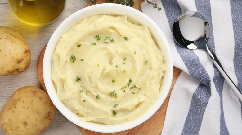 Mashed potatoes in white bowl