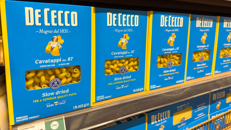 Packages of pasta on shelf