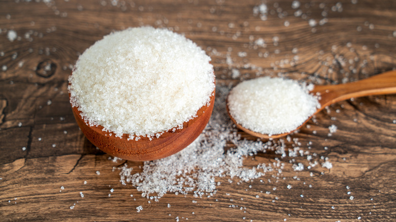 Bowl and spoonful of sugar