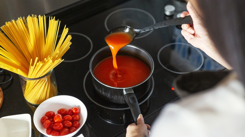 Tomato sauce in a pan on the stove
