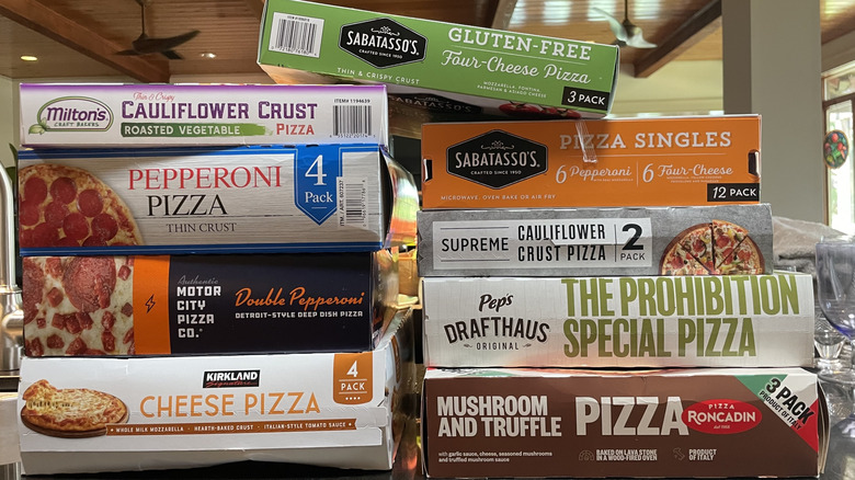 Different pizza brands stacked