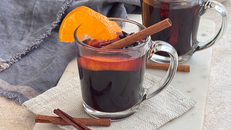 mulled wine in mug with garnishes