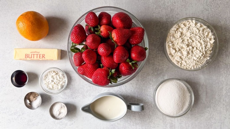 Strawberry and cardamom biscuit cobbler ingredients on countertop
