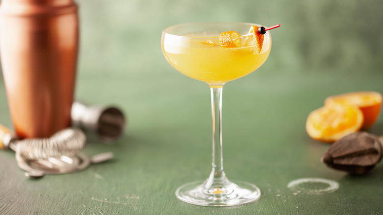 Orange cocktail in a coupe glass