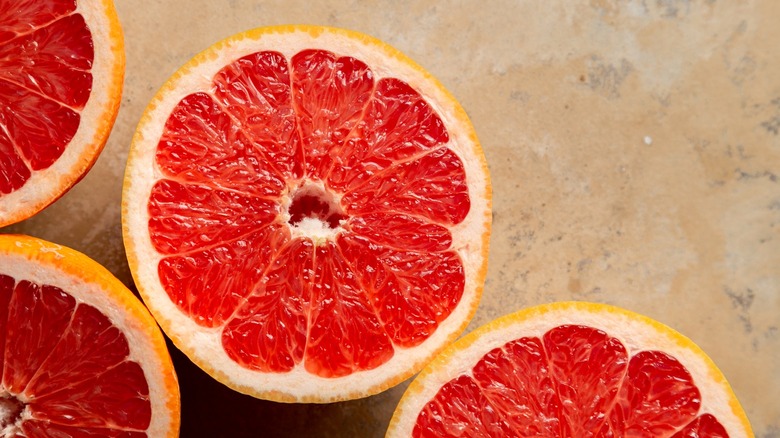 Grapefruit halves on countertop