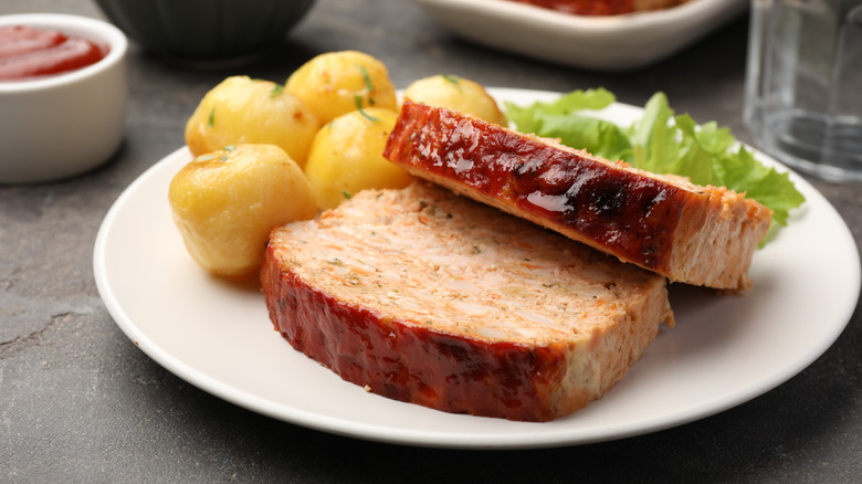 turkey meatloaf served alongside potatoes