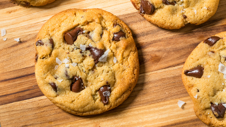 Chocolate chip cookies on a wood board