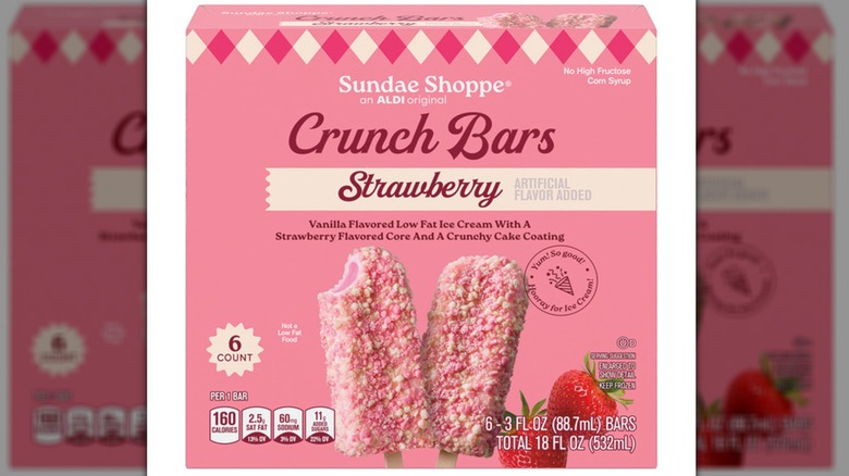 Package showing two strawberry ice cream bars that have a candy coating