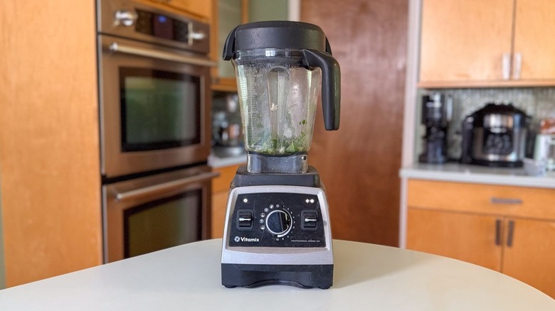 Orzo salad dressing ingredients in blender pitcher