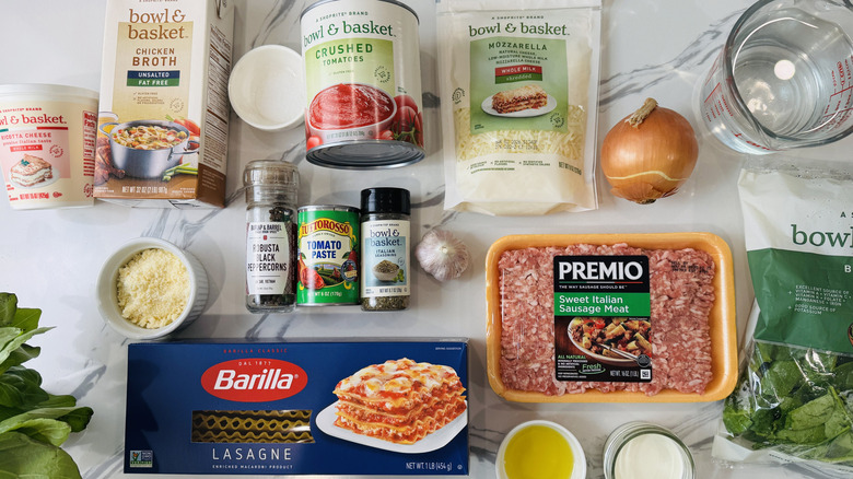 sausage, vegetables, cheese, seasonings, and noodles