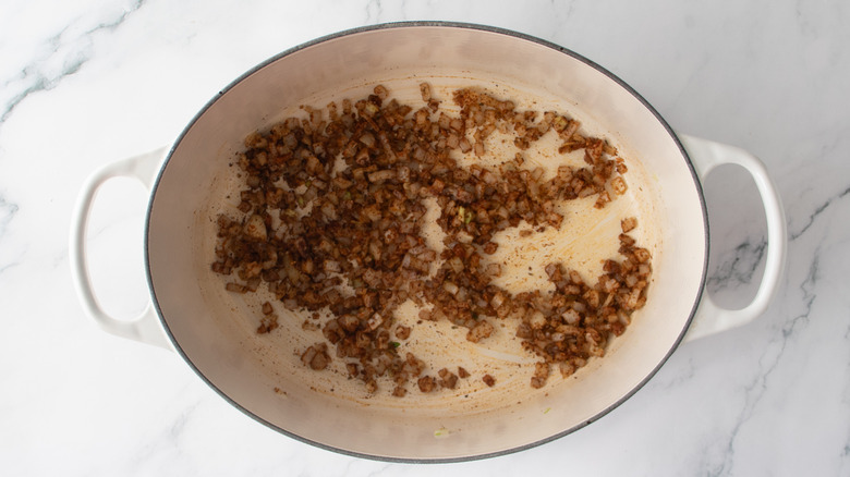 Seasoned sauteed onions in a Dutch oven