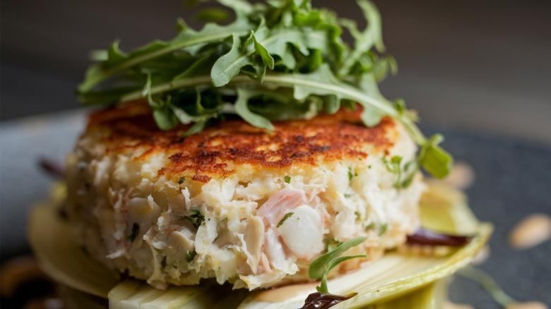 Crab cake topped wtih greens