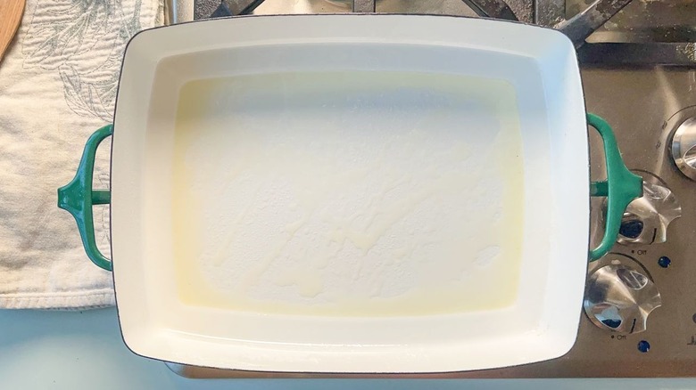 Oiled rectangular baking dish on stovetop