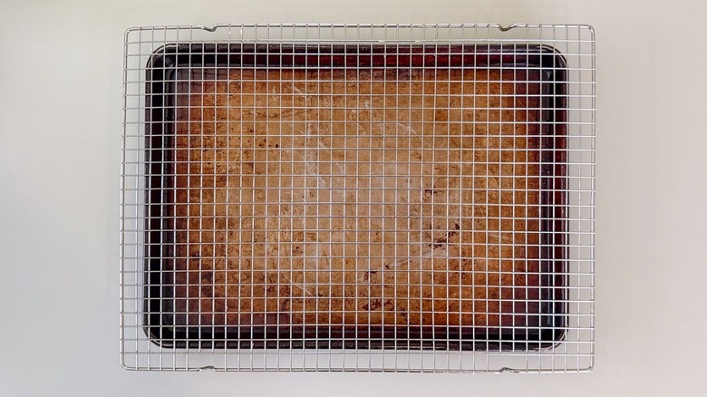 Cooling rack fitted over a baking sheet