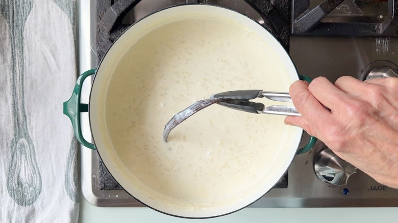 Removing vanilla bean pod from cooked rice in milk