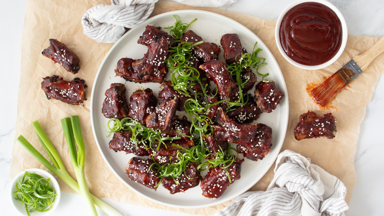 garnish the riblets with scallions