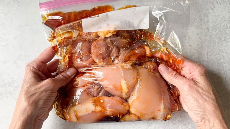 Chicken thighs in honey lime habanero marinade in ziplock bag