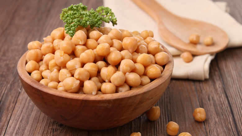 wooden bowl of drained and rinsed chickpeas.
